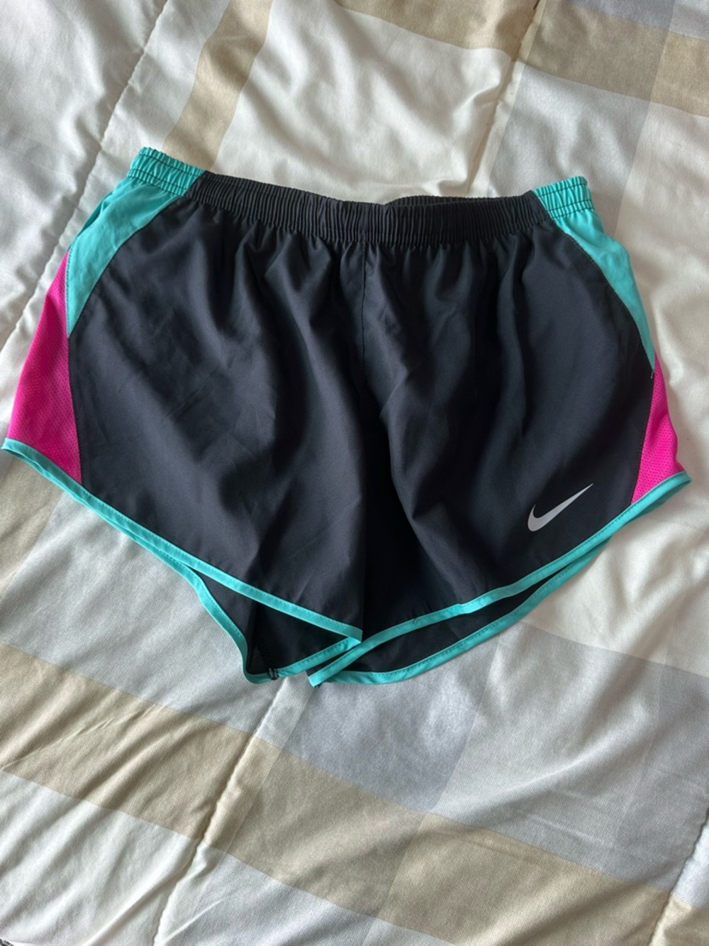 Nike Women's Black Athletic Shorts with Turquoise Trim and Pink Accents